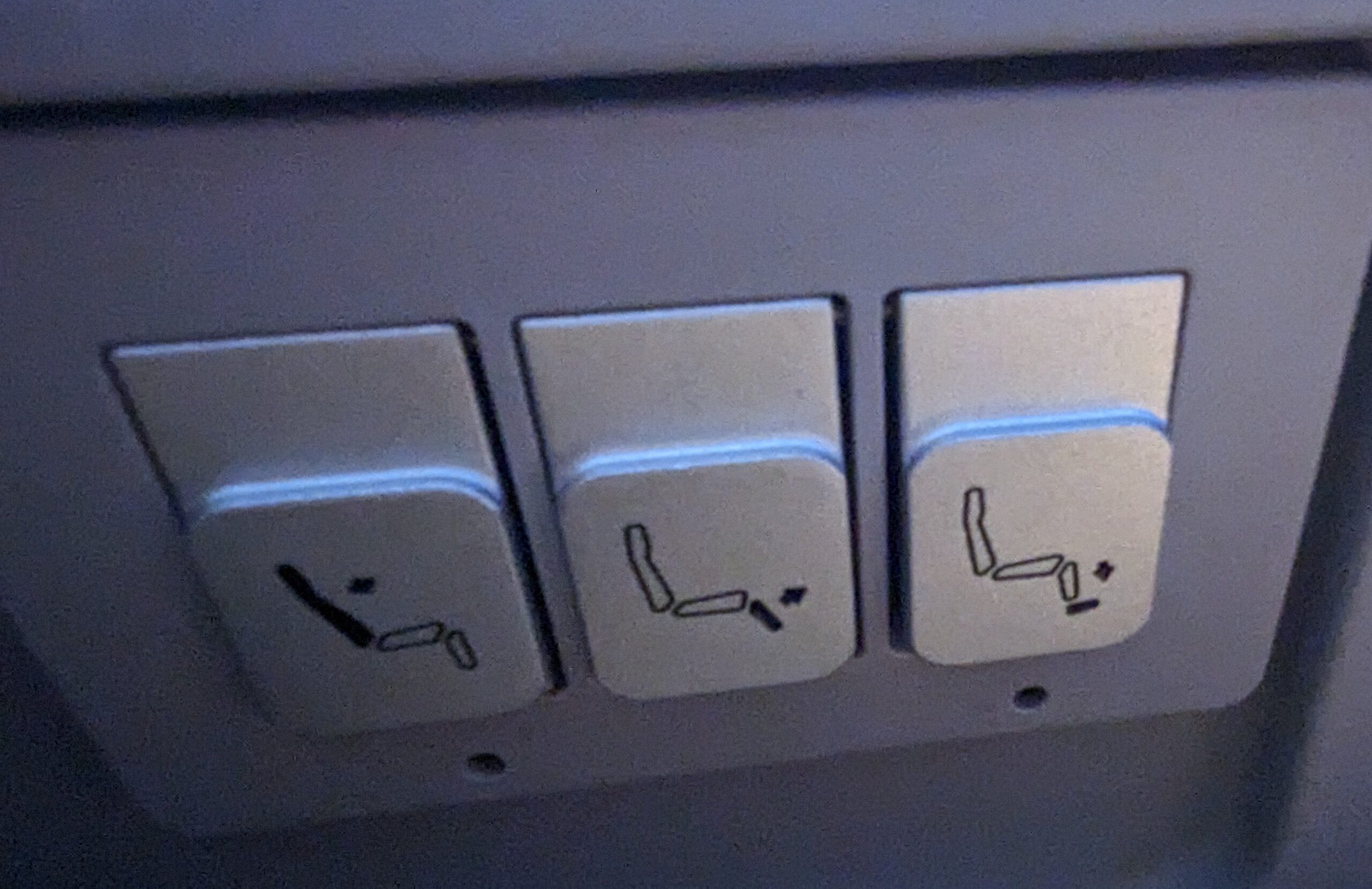 a close up of a seat buttons