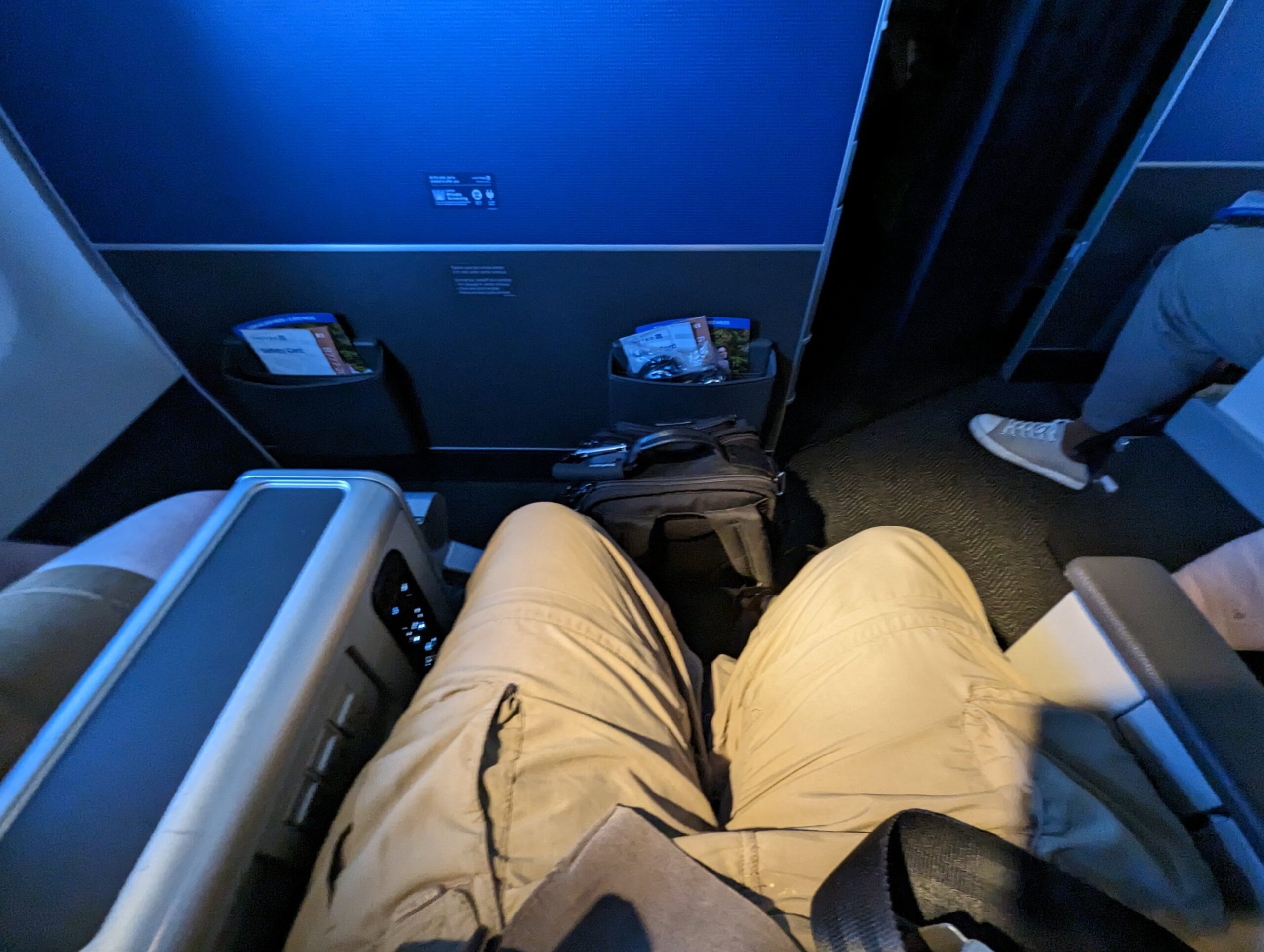 a person's legs in a seat