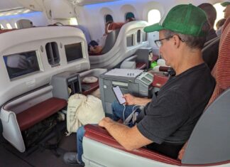 a man sitting in an airplane