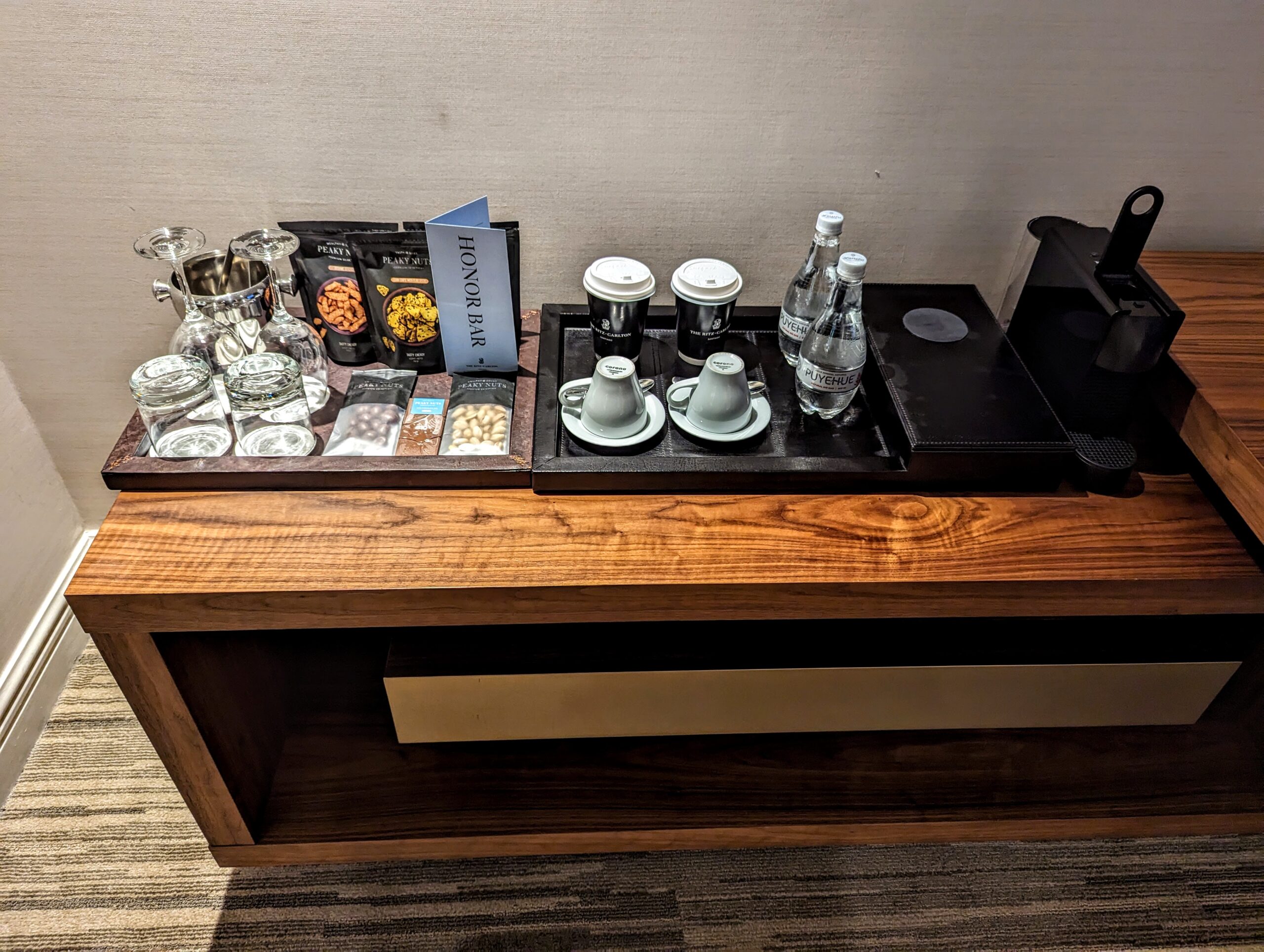 a coffee table with coffee cups and coffee beans