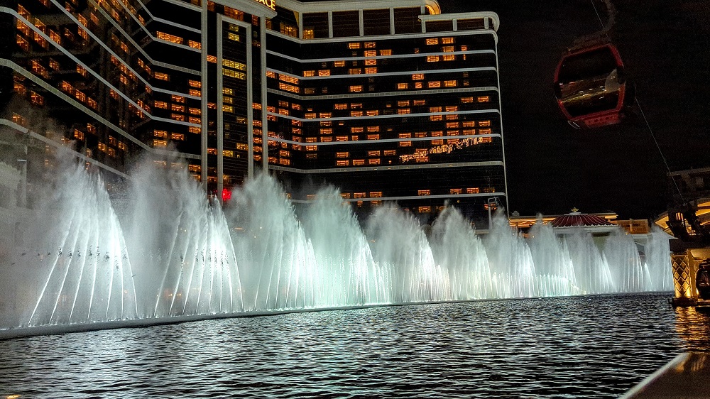 a water fountain in front of a building