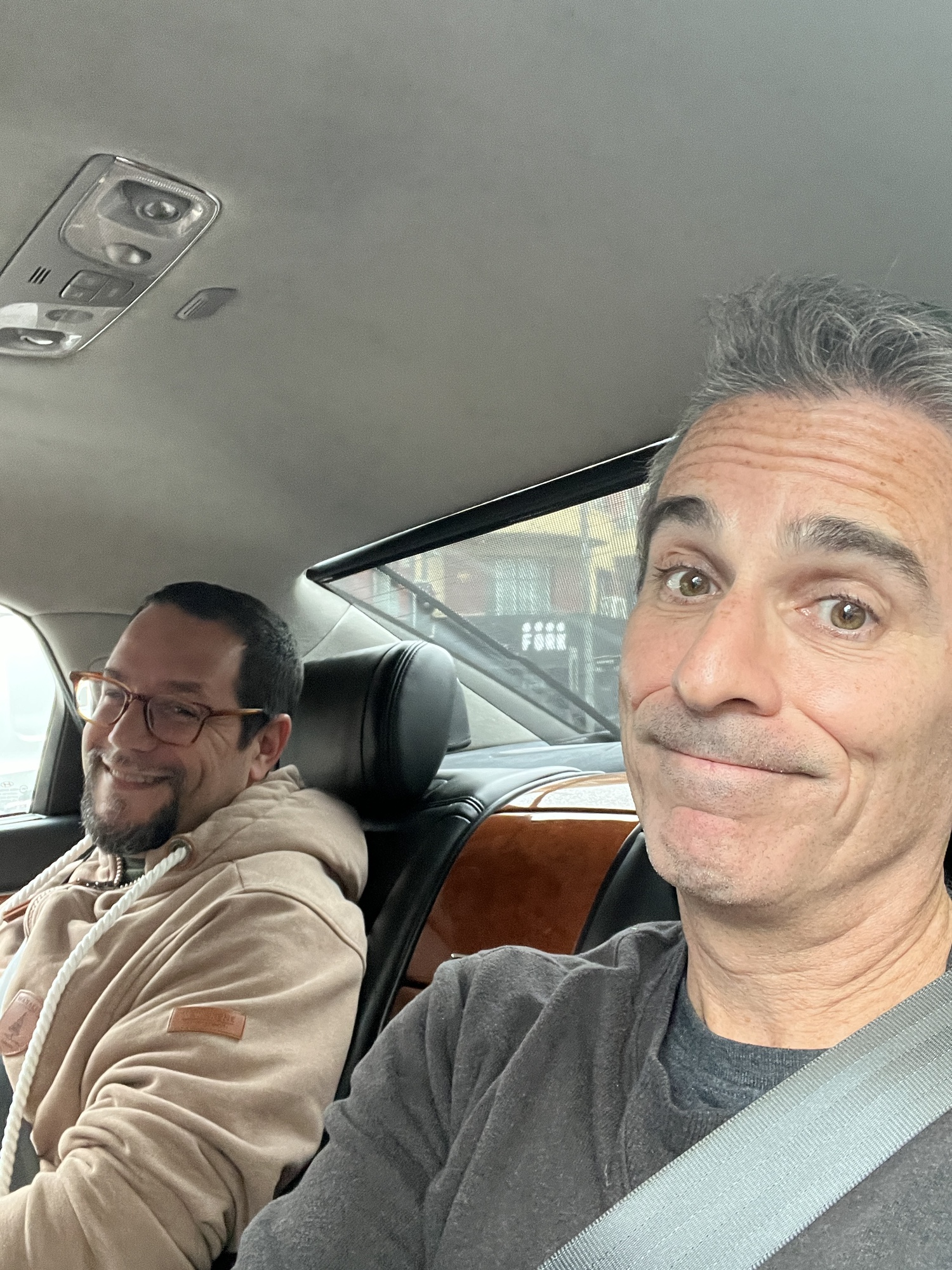 two men in a car
