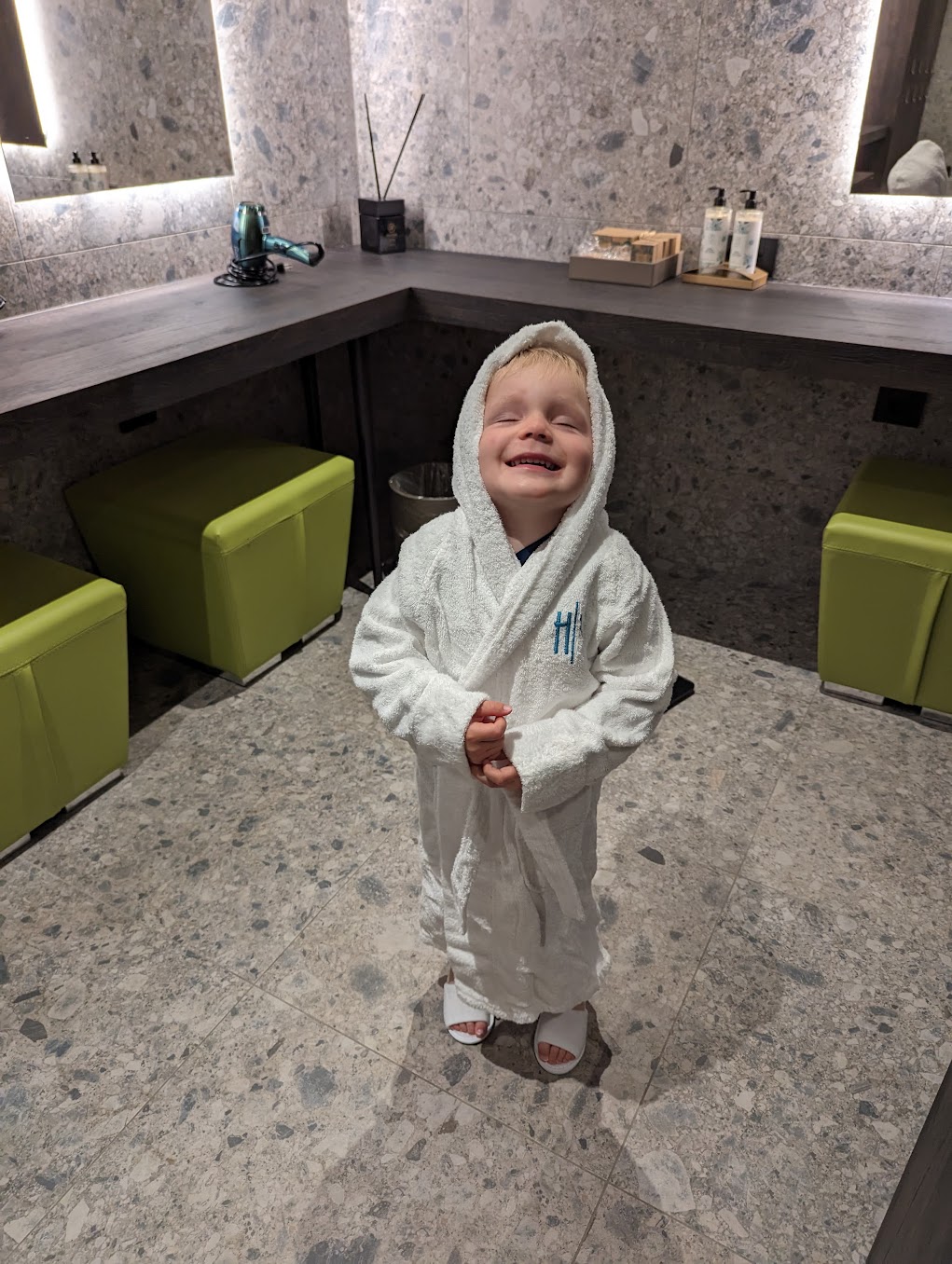 a child in a bathrobe