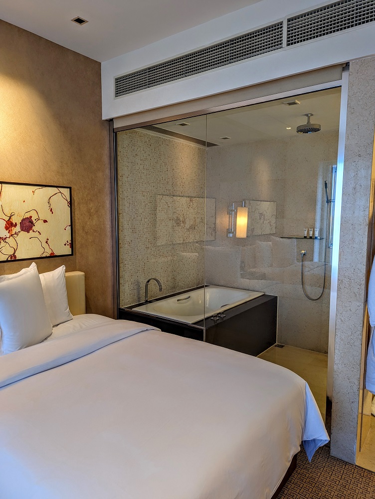 Grand Hyatt Macau - View of the bathroom from the bedroom; the blind lowered for privacy