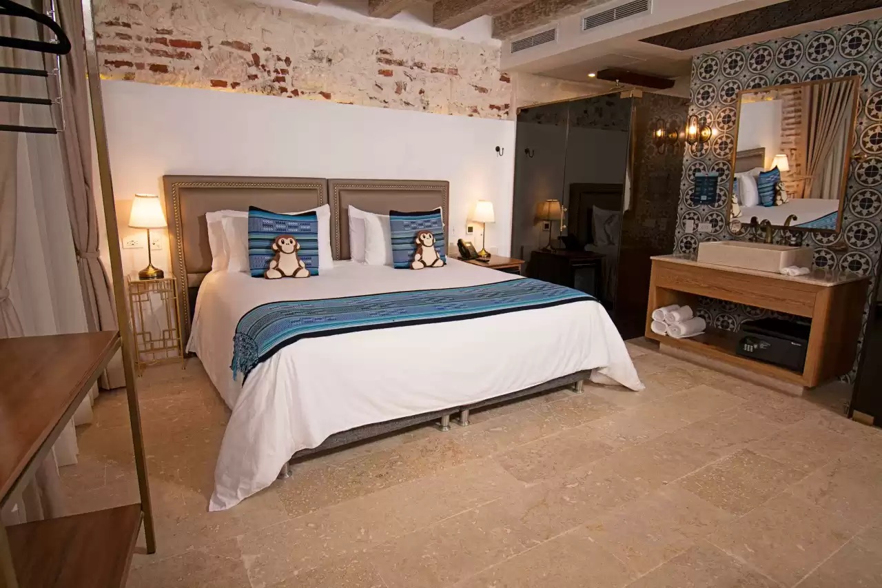 One of the bedrooms in the 2 bedroom suite at the Hotel Casa La Factoria By Faranda Boutique, a Member of Radisson Individuals in Cartagena, Colombia