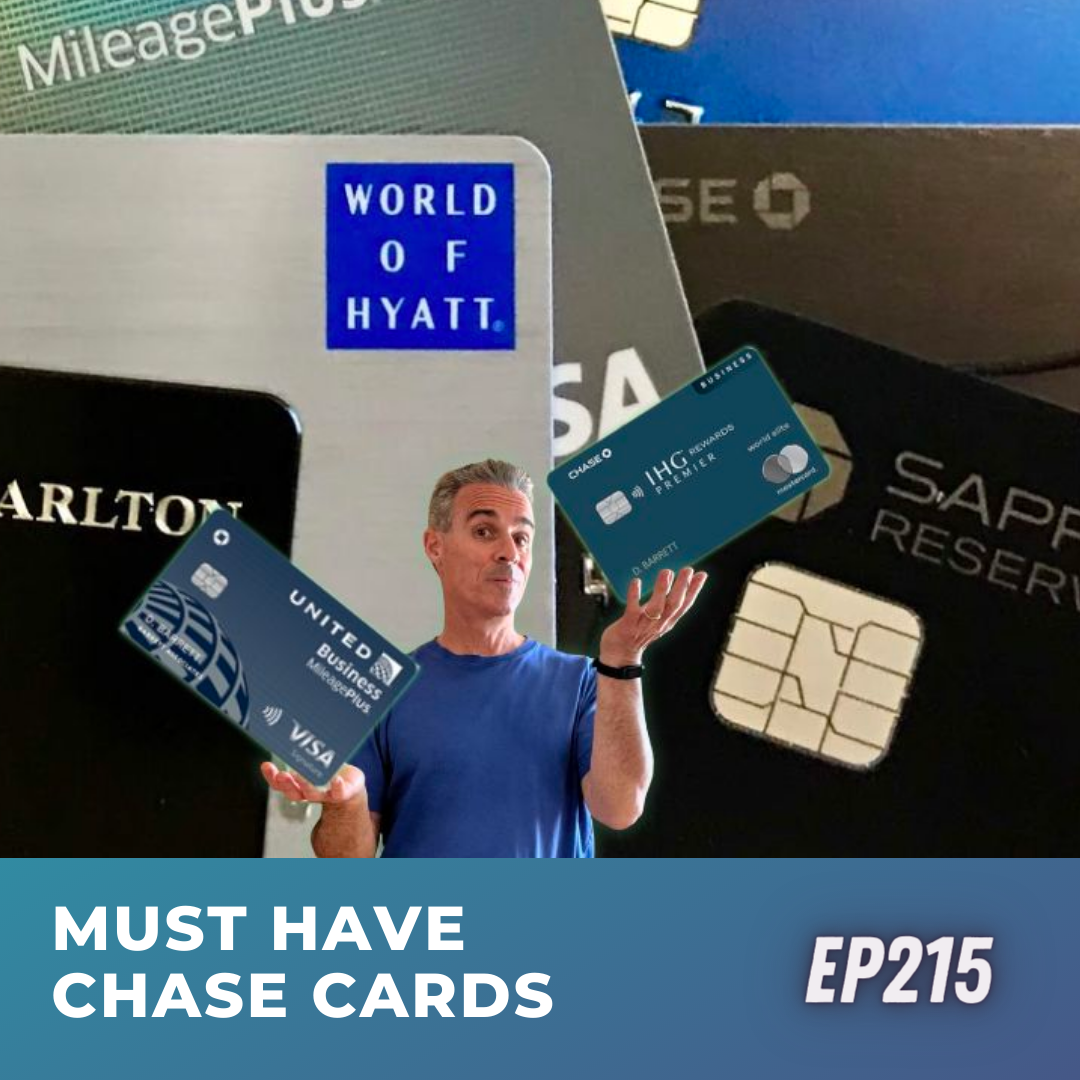 a man holding up some credit cards