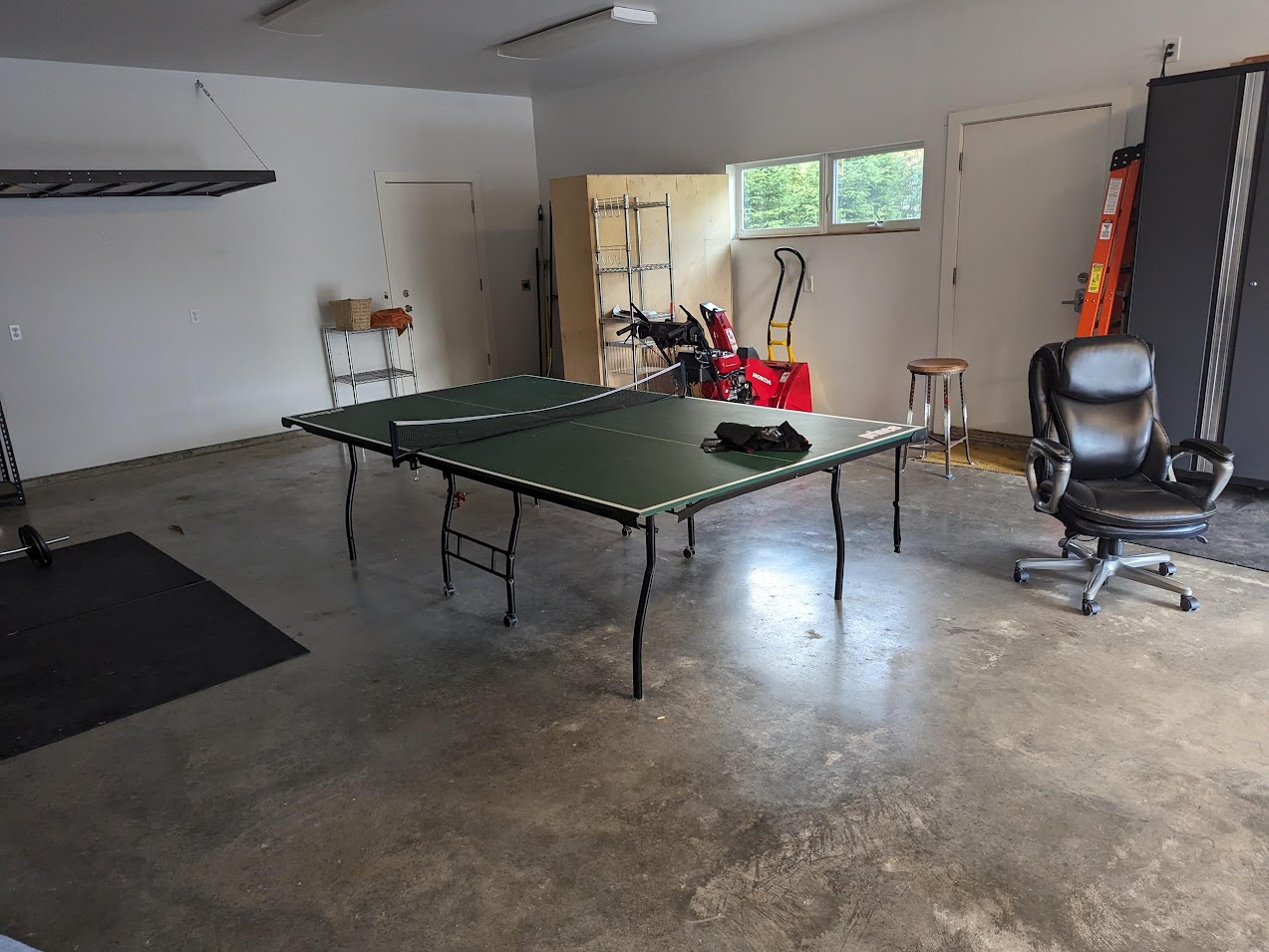 a ping pong table in a garage