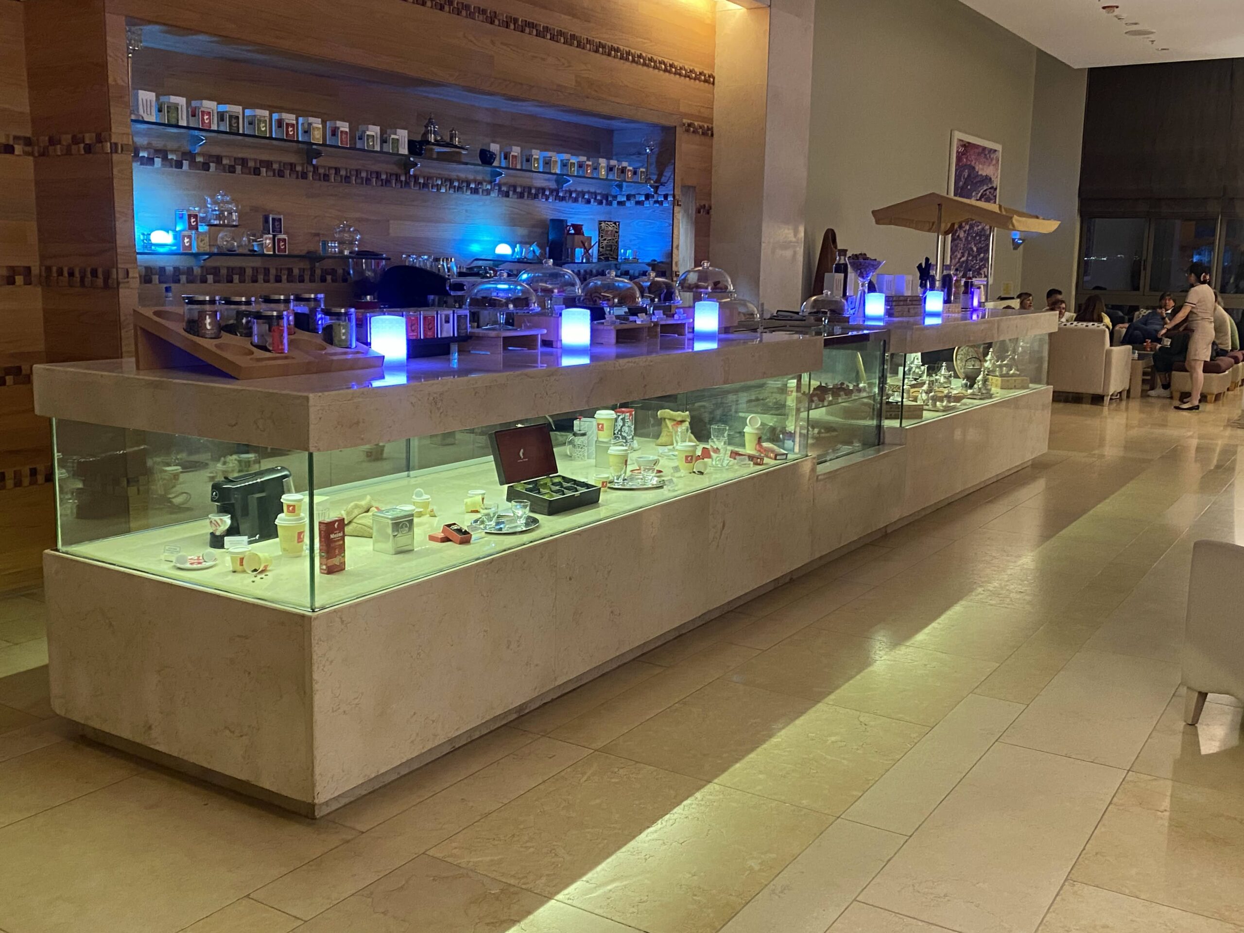a counter with glass cases and other objects on it
