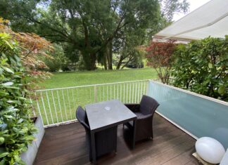 a table and chairs on a deck