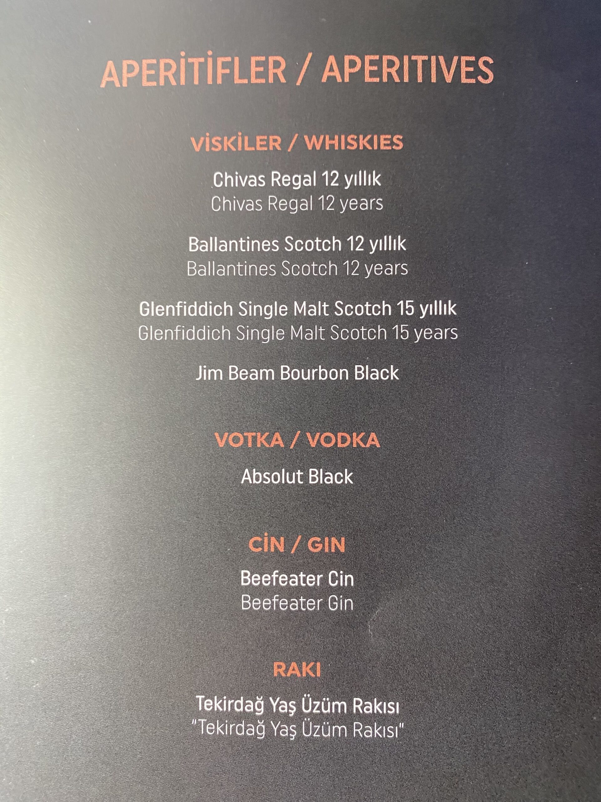 a menu with white text and orange letters