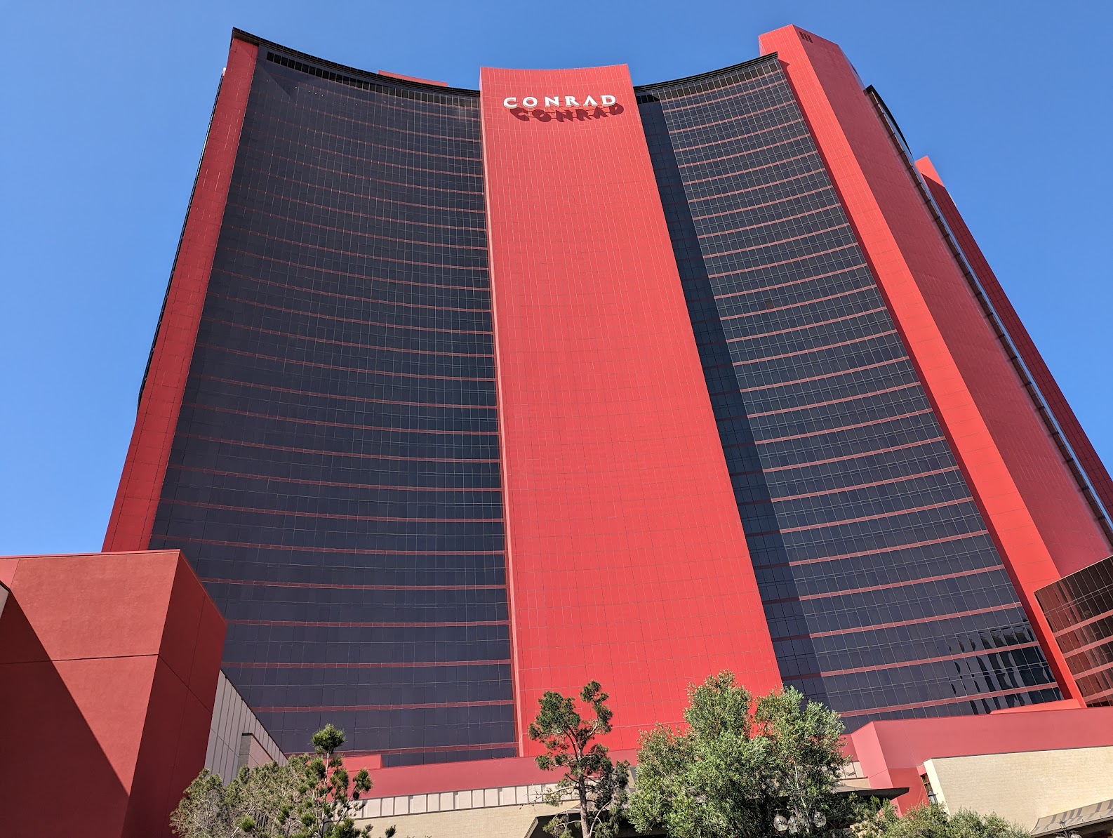 a tall red and black building