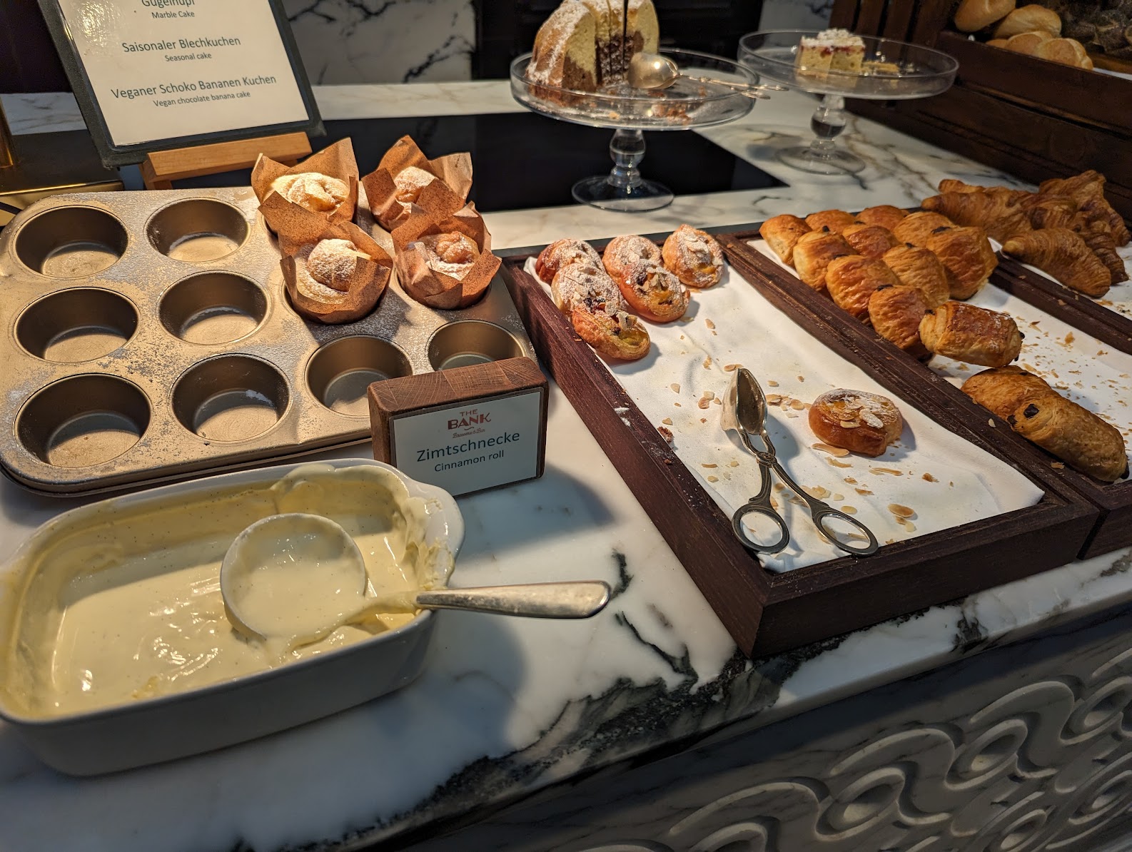a tray of pastries and pastries on a counter