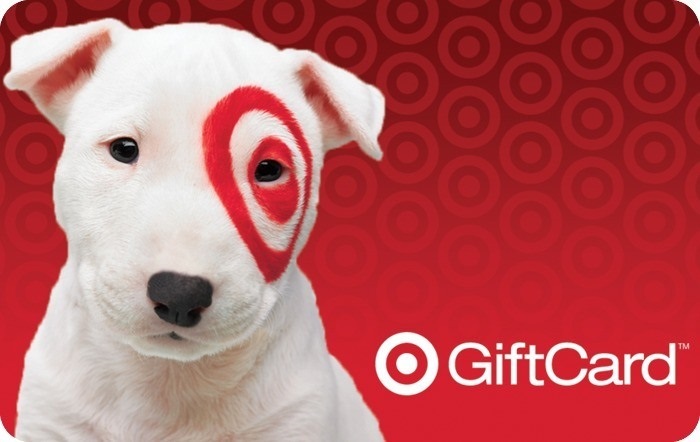 a white puppy with a red target on its eye