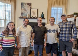 a group of people posing for a photo