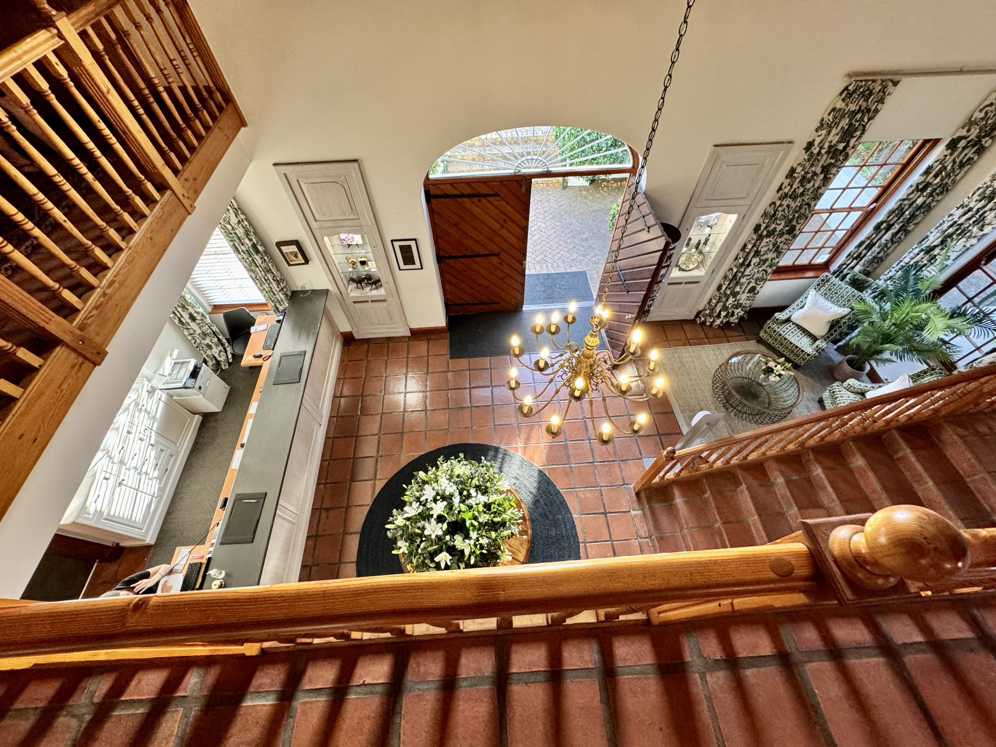 a view from the top of a staircase in a house