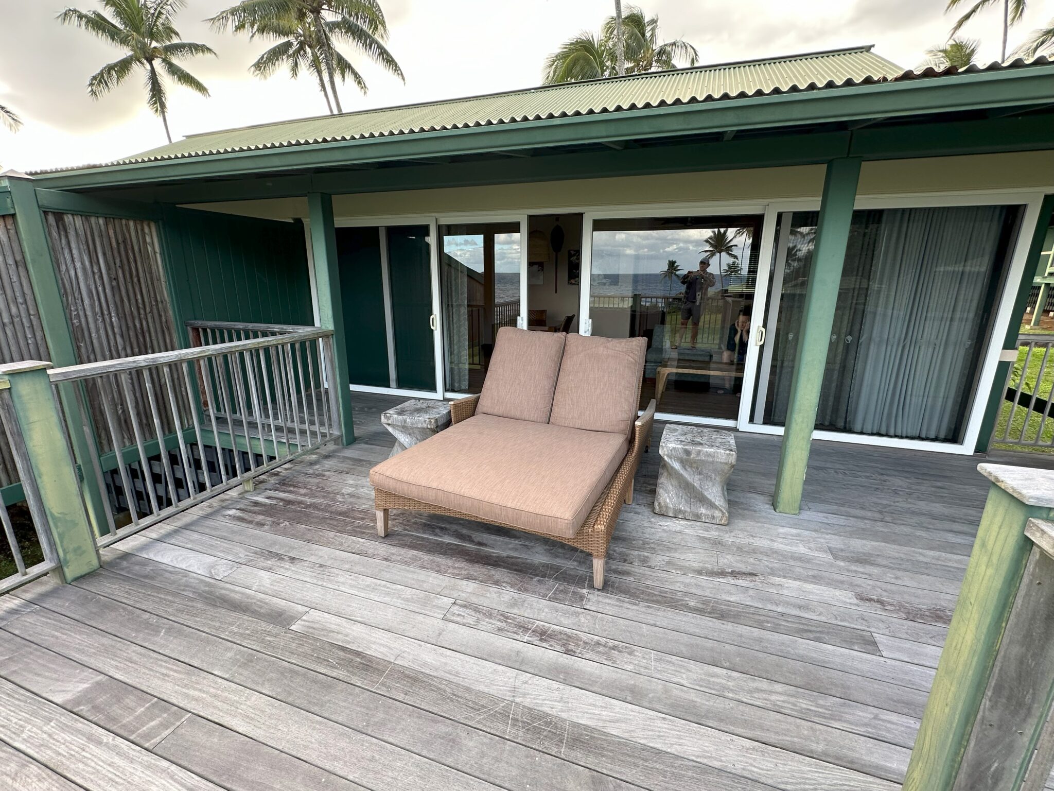 a deck with a chair on it