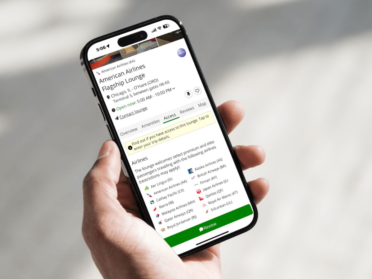 Cell phone showing LoungeReview app looking at airport ORD (Chicago) and the AA flagship lounge access details