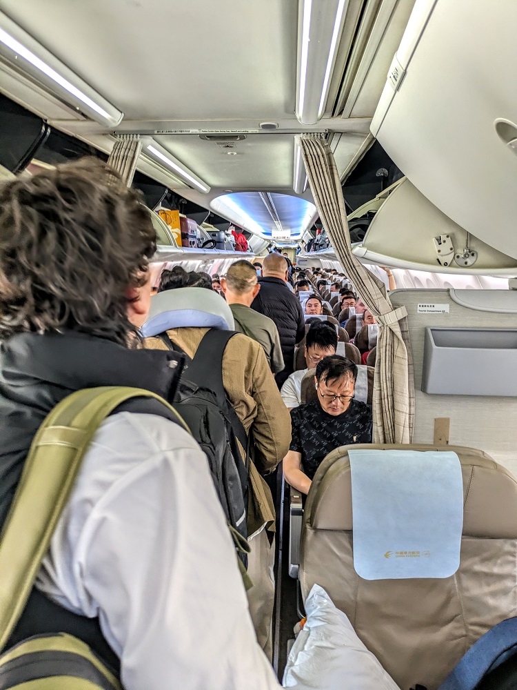 I'd never been so glad to board a full economy class flight