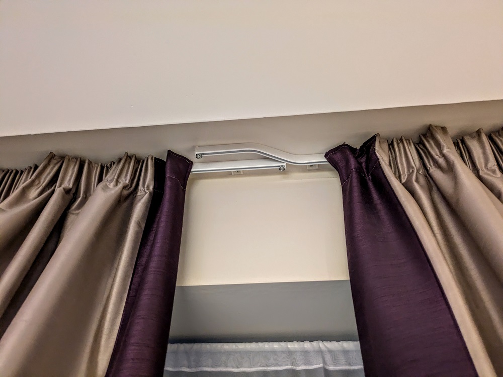 Premier Inn London Heathrow Terminal 4 - The curtain rails overlap to ensure the room stays dark