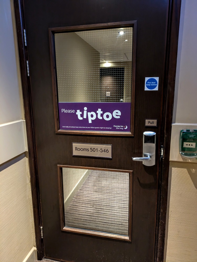 Premier Inn London Heathrow Terminal 4 - There's a door separating the elevator area from the bedroom hallways to ensure the hallways remain quiet