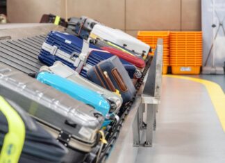 Luggage carousel airport suitcases