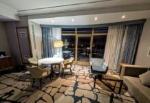 Pick an upgrade within in-app check-in, a cheap flight challenge, angry hotel owners and more (Around the Web) London Hilton on Park Lane - Deluxe Park Lane Suite living room