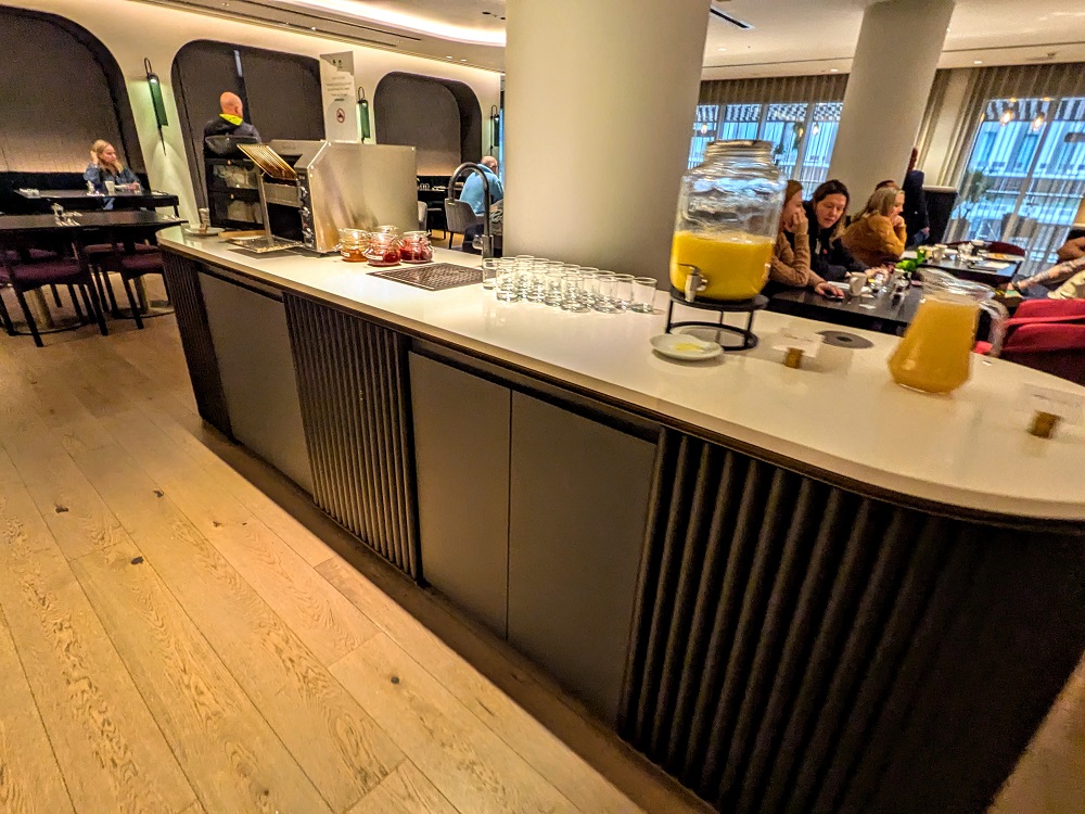 Hyatt House London Stratford breakfast - Bread, toaster, water tap, & juice