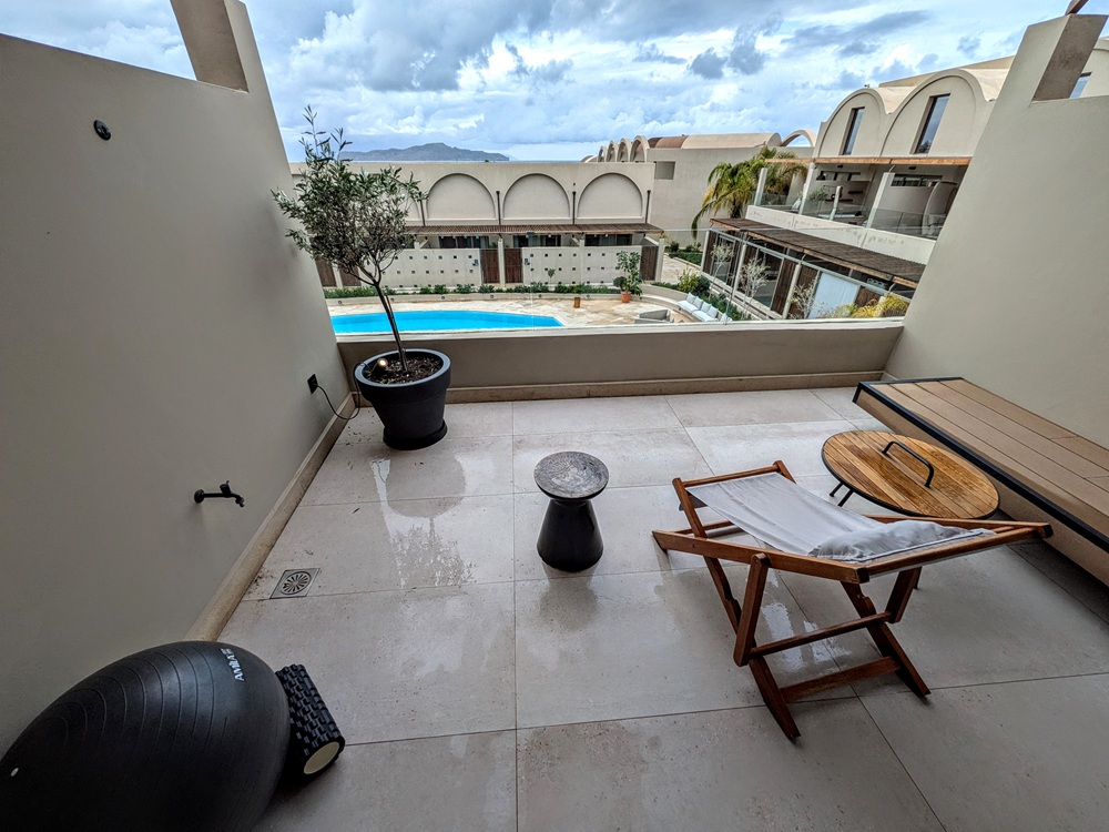 Domes Noruz Chania, Crete - Balcony outside our bedroom with seating and yoga equipment