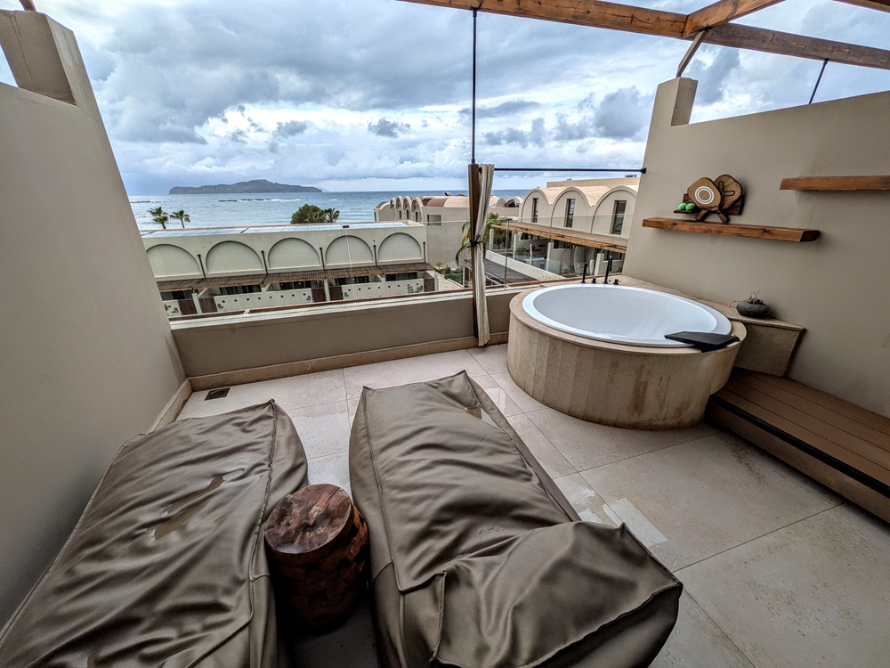 Domes Noruz Chania, Crete - Wellness Loft balcony with a jacuzzi and bean bag loungers that my wife adored