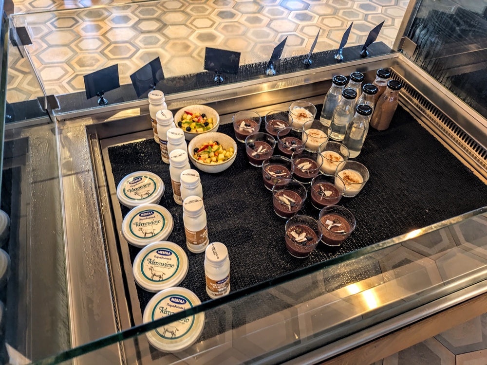 Domes Noruz Chania breakfast - Fresh fruit bowl, chocolate chia bowl, oats, smoothies, & more