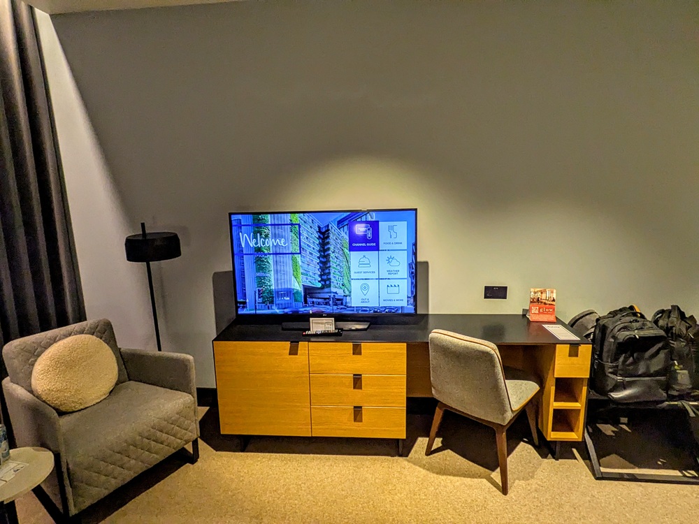 Hilton Woking, England - Armchair, desk, dresser, mini fridge & tv
