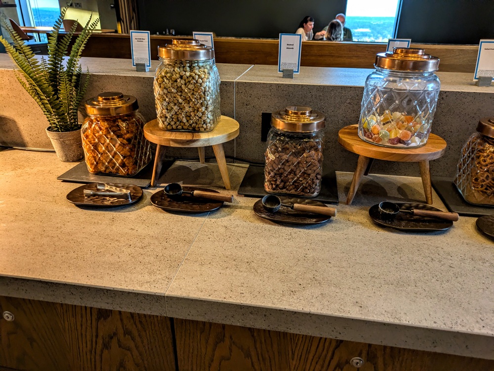 Hilton Woking executive lounge - Hot chili rice crackers, wasabi peas, roasted almonds, & gummy candy